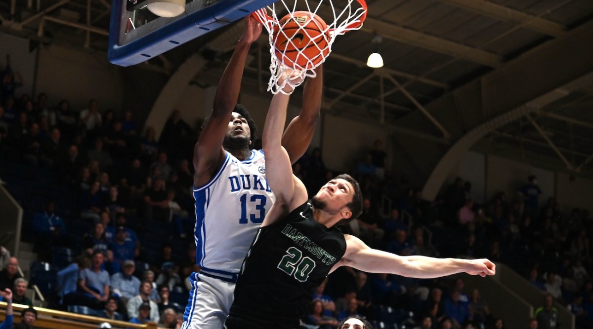 Duke Blue Devils forward Sean Stewart (13) dunks over Dartmouth Big Green guard Romeo Myrthil (20) during the second half at Cameron Indoor Stadium in Durham, North Carolina, on Nov. 6, 2023.